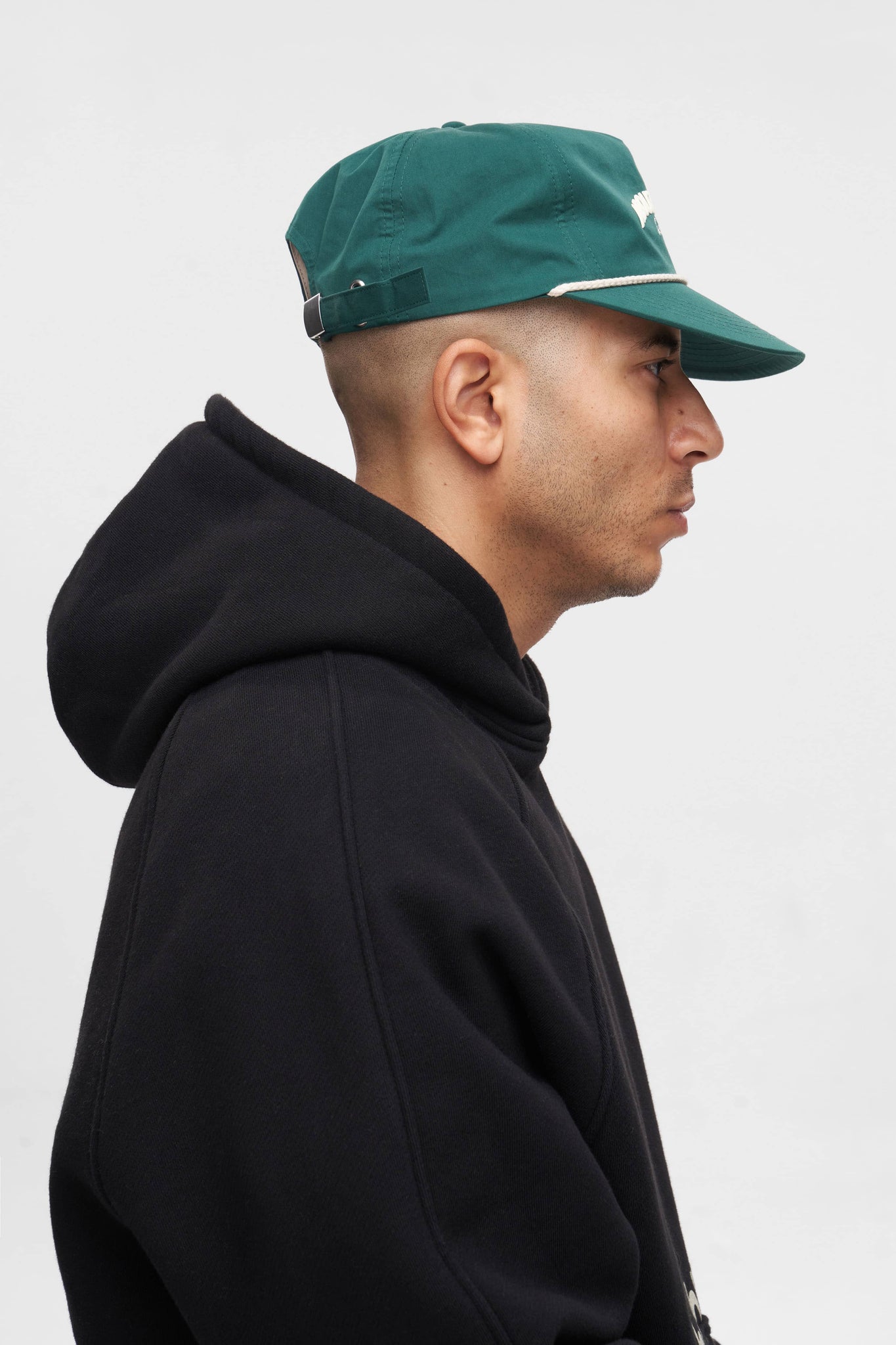 arched logo rope cap epsom green