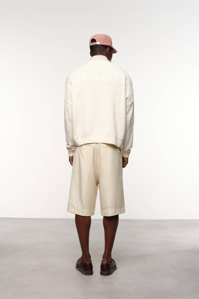 loose knit rolled crewneck ecru