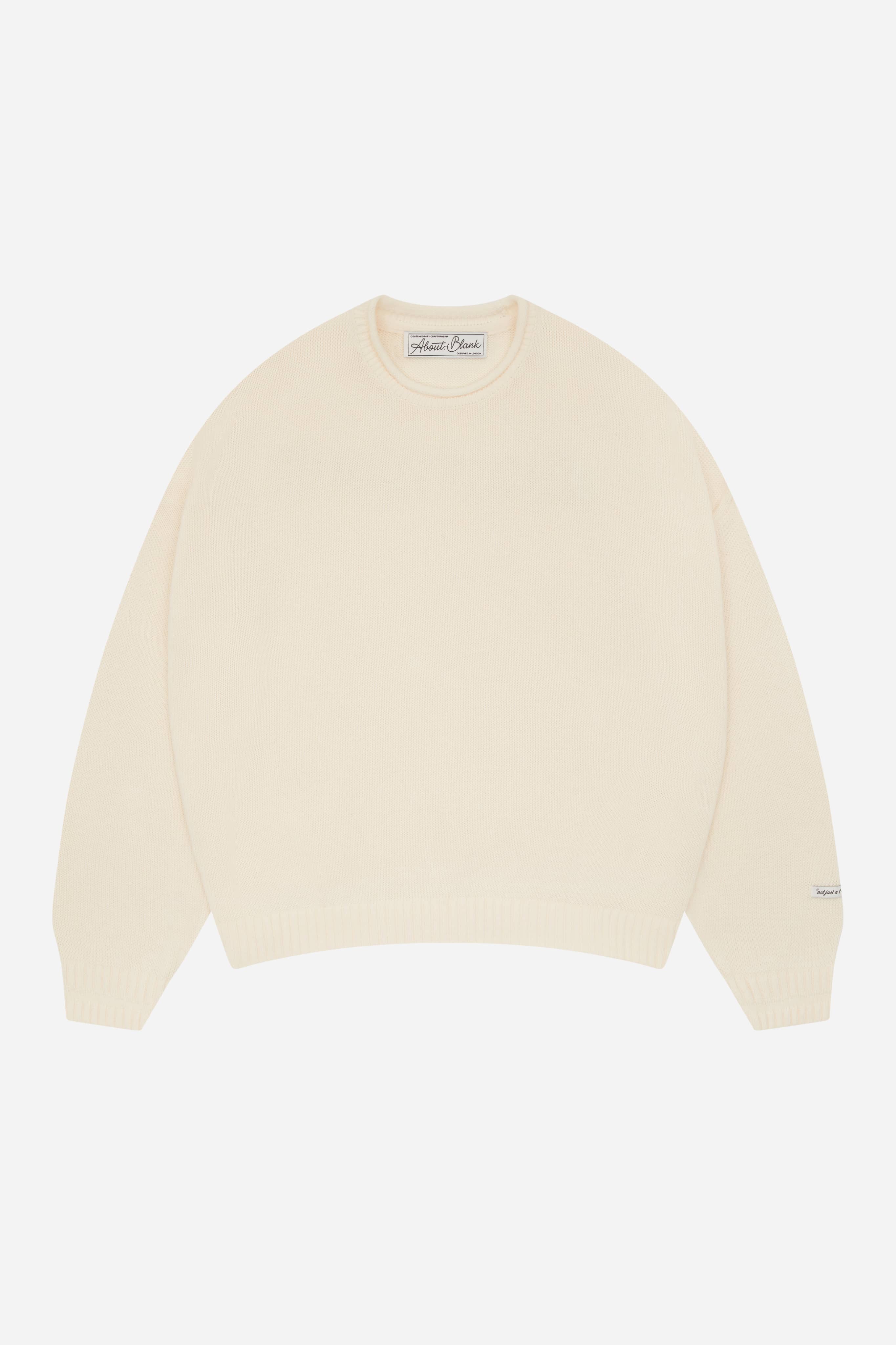 about:blank | loose knit rolled crewneck ecru