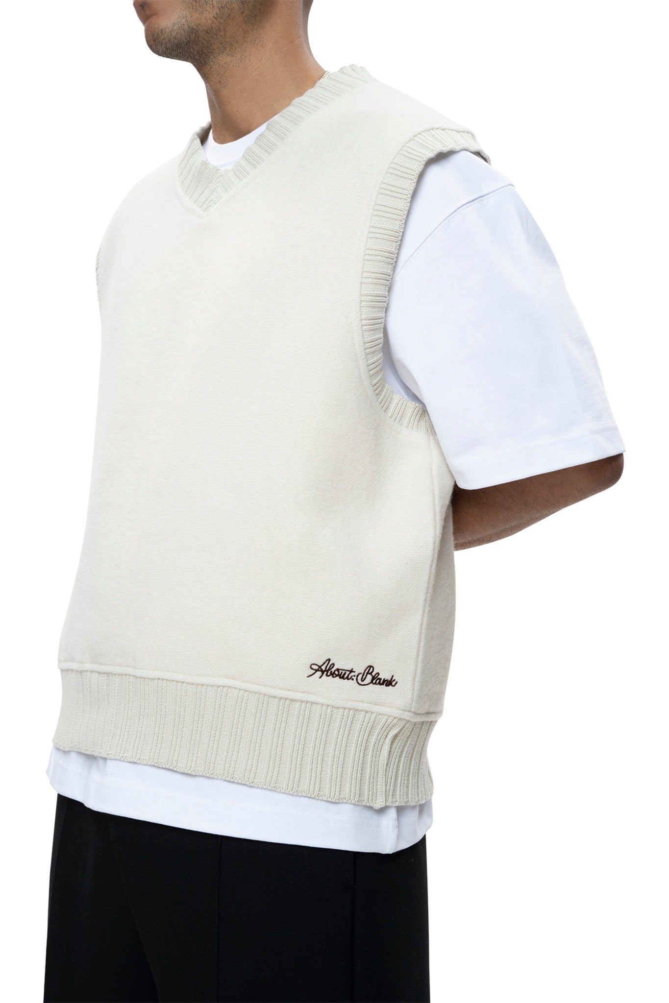 about---blank.comv-neck wool vest ecru